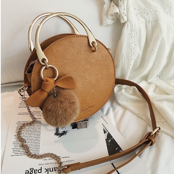 B00377 IDR.170.000 MATERIAL PU SIZE L18XH19XW7CM WEIGHT 650GR COLOR BROWN