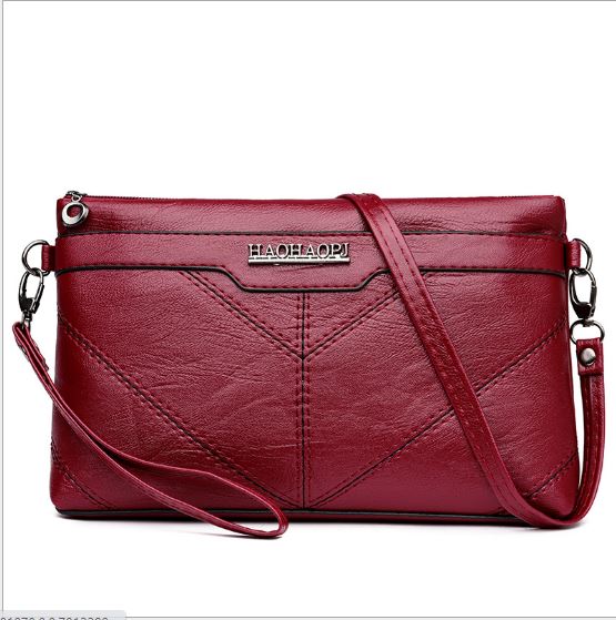 JT00205 IDR.141.000 MATERIAL PU SIZE L25XH15XW5CM WEIGHT 300GR COLOR RED