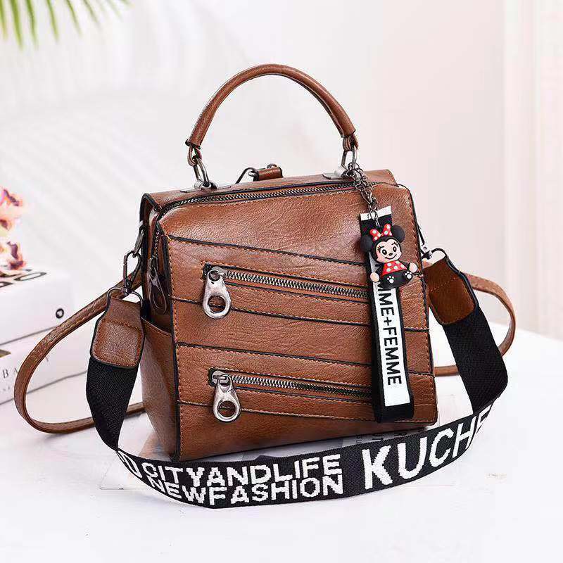 JT003 IDR.172.000 MATERIAL PU SIZE L21XH20XW13CM WEIGHT 750GR COLOR DARKBROWN