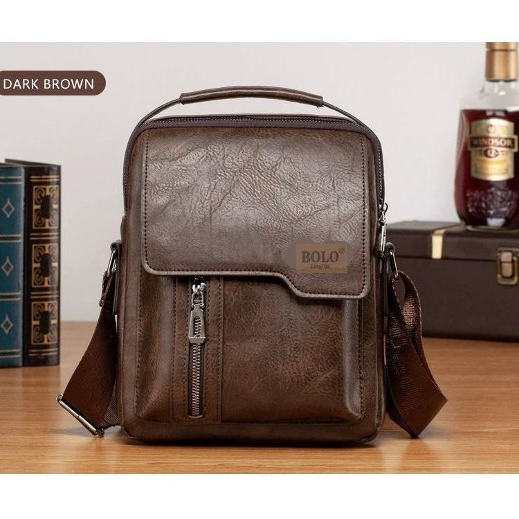 JT0114 IDR.169.000 MATERIAL PU SIZE L21XH24XW9CM WEIGHT 500GR COLOR DARKBROWN
