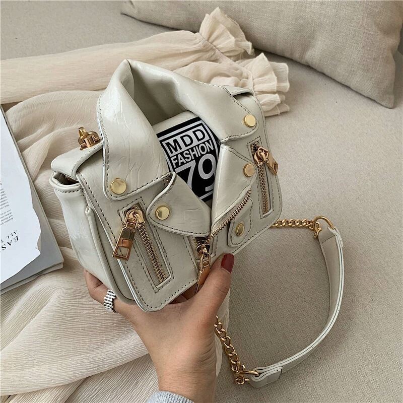 JT033508 IDR.169.000 MATERIAL PU SIZE L17XH14XW6CM WEIGHT 500GR COLOR BEIGE