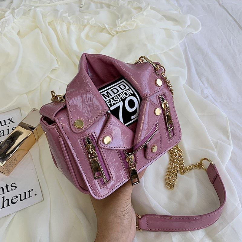 JT033508 IDR.169.000 MATERIAL PU SIZE L17XH14XW6CM WEIGHT 500GR COLOR PURPLE