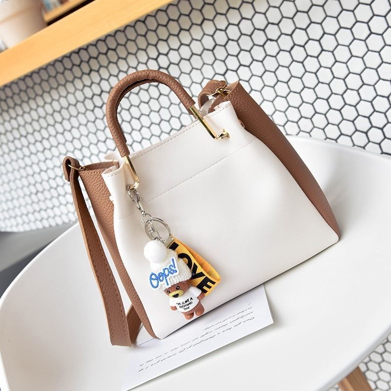 JT096 IDR.179.000 MATERIAL PU SIZE L22XH19XW10CM WEIGHT 650GR (2IN1) COLOR WHITEBROWN