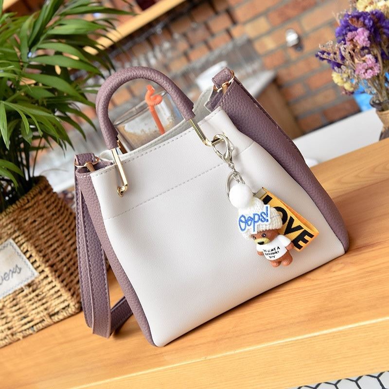 JT096 IDR.179.000 MATERIAL PU SIZE L22XH19XW10CM WEIGHT 650GR (2IN1) COLOR WHITEPURPLE