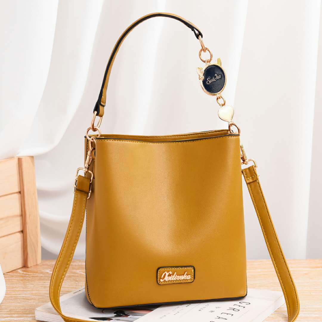 JT1212 IDR.193.000 MATERIAL PU SIZE L21XH22XW12CM WEIGHT 600GR COLOR YELLOW