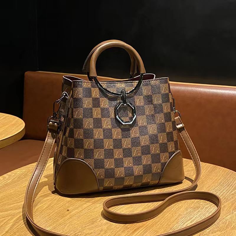 JT188882 IDR.180.000 MATERIAL PU SIZE L23XH19XW11CM WEIGHT 550GR COLOR GRIDBROWN
