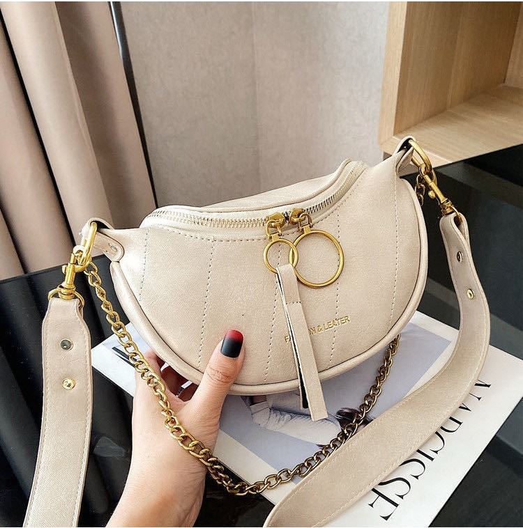 JT30337 IDR.156.000  MATERIAL PU SIZE L15XH14XW6CM WEIGHT 350GR COLOR BEIGE