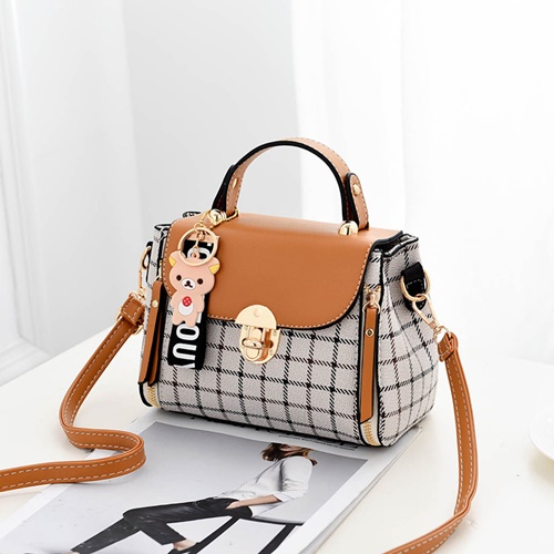 JT387 IDR.150.000 MATERIAL CANVAS SIZE L20XH15XW11CM WEIGHT 600GR COLOR BROWN