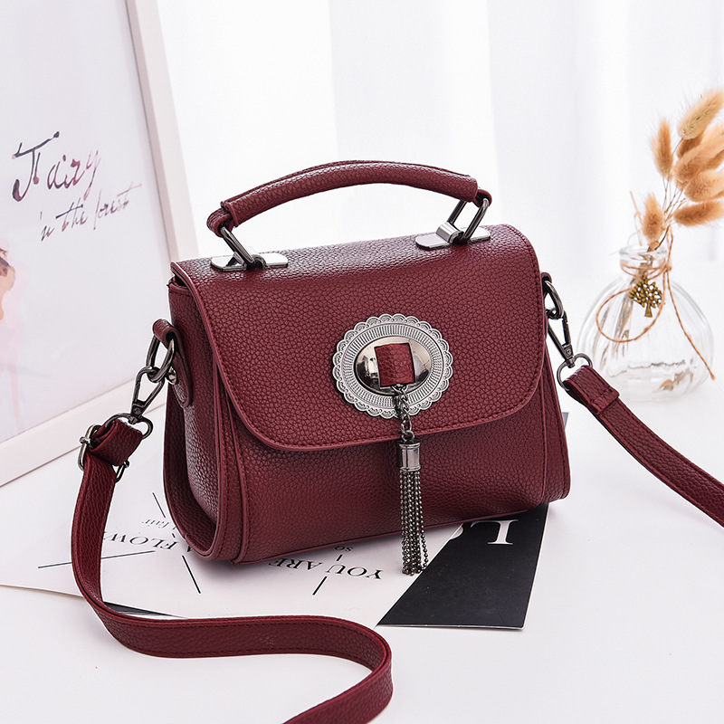 JT6972 IDR.163.000 MATERIAL PU SIZE L21XH15XW10CM WEIGHT 650GR COLOR WINE
