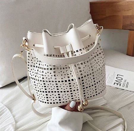JT9643 IDR.162.000 MATERIAL PU SIZE L21XH13XW14CM WEIGHT 350GR COLOR BEIGE