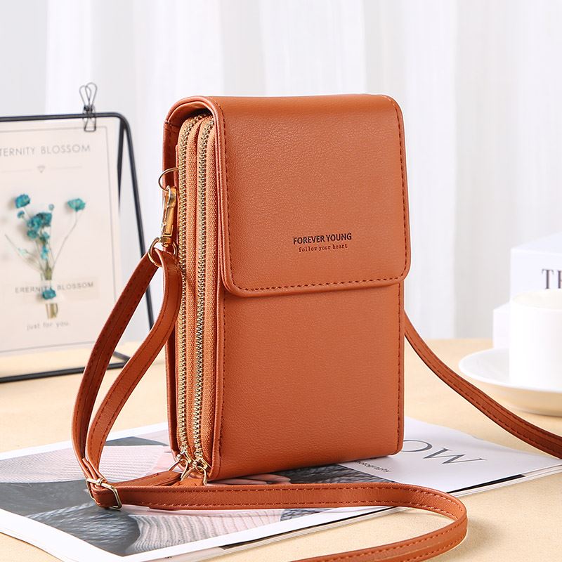 JTF09067 IDR.91.000 MATERIAL PU SIZE L11.5XH18.5XW6.5CM WEIGHT 200GR COLOR BROWN