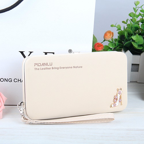 JTF1311 IDR.35.000 MATERIAL PU SIZE L18.5XH10.5XW2.8CM WEIGHT 250GR COLOR BEIGE