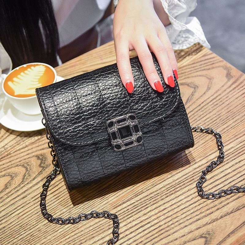 JTF14100 IDR.35.000 MATERIAL PU SIZE L17.5XH13XW9CM WEIGHT 500GR COLOR BLACK