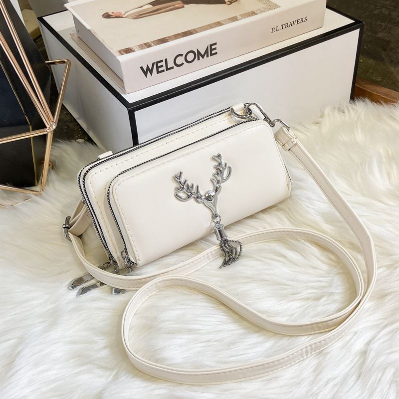 JTF28765 IDR.75.000 MATERIAL PU SIZE L20XH10XW6CM WEIGHT 450GR COLOR WHITE