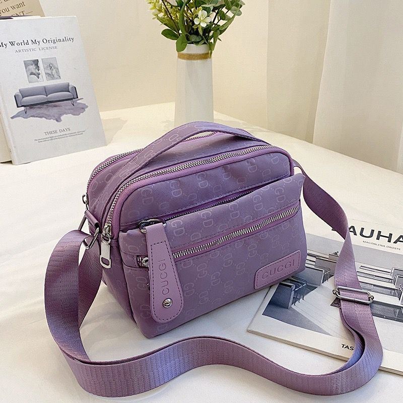 JTF3380 IDR.65.000 MATERIAL OXFORD SIZE L26XH16XW9CM WEIGHT 390GR COLOR PURPLE