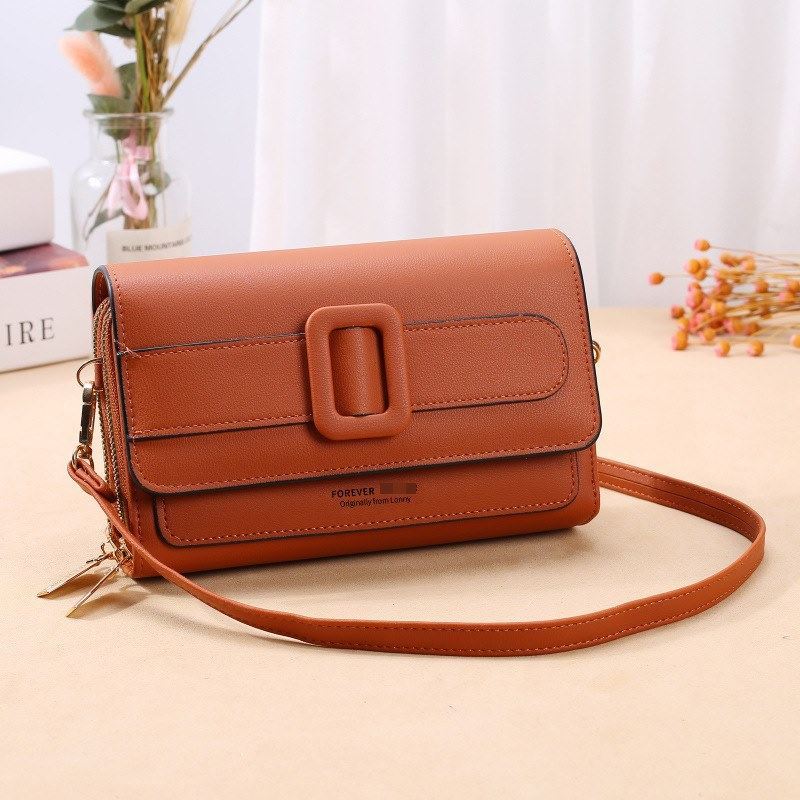 JTF39981 IDR.65.000 MATERIAL PU SIZE L19XH11XW5CM WEIGHT 400GR COLOR BROWN