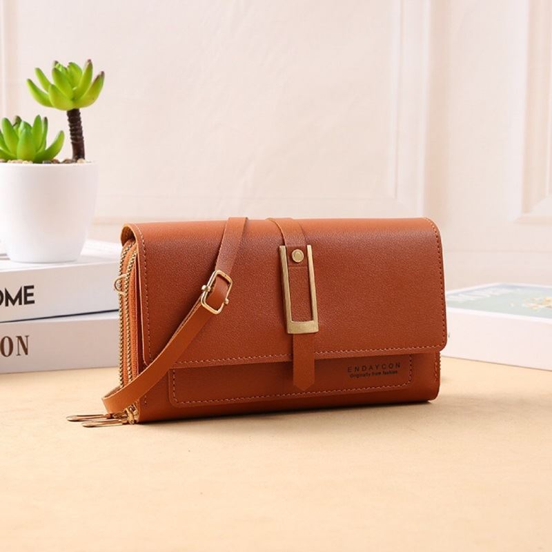 JTF7125 IDR.45.000 MATERIAL PU SIZE L19XH11XW4CM WEIGHT 150GR COLOR BROWN