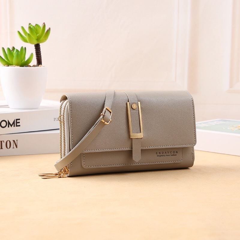 JTF7125 IDR.45.000 MATERIAL PU SIZE L19XH11XW4CM WEIGHT 150GR COLOR GRAY