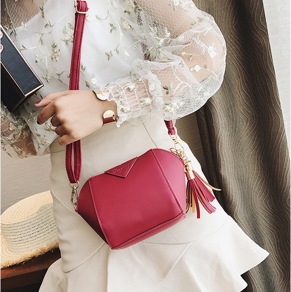 JTF81406 IDR.55.000 MATERIAL PU SIZE L12.5XH15XW11CM WEIGHT 350GR COLOR RED