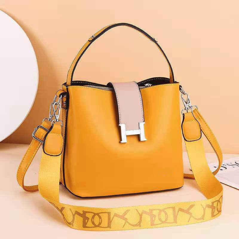 JTF88071A IDR.105.000 MATERIAL PU SIZE L23XH20XW12.5CM WEIGHT 650GR COLOR YELLOW